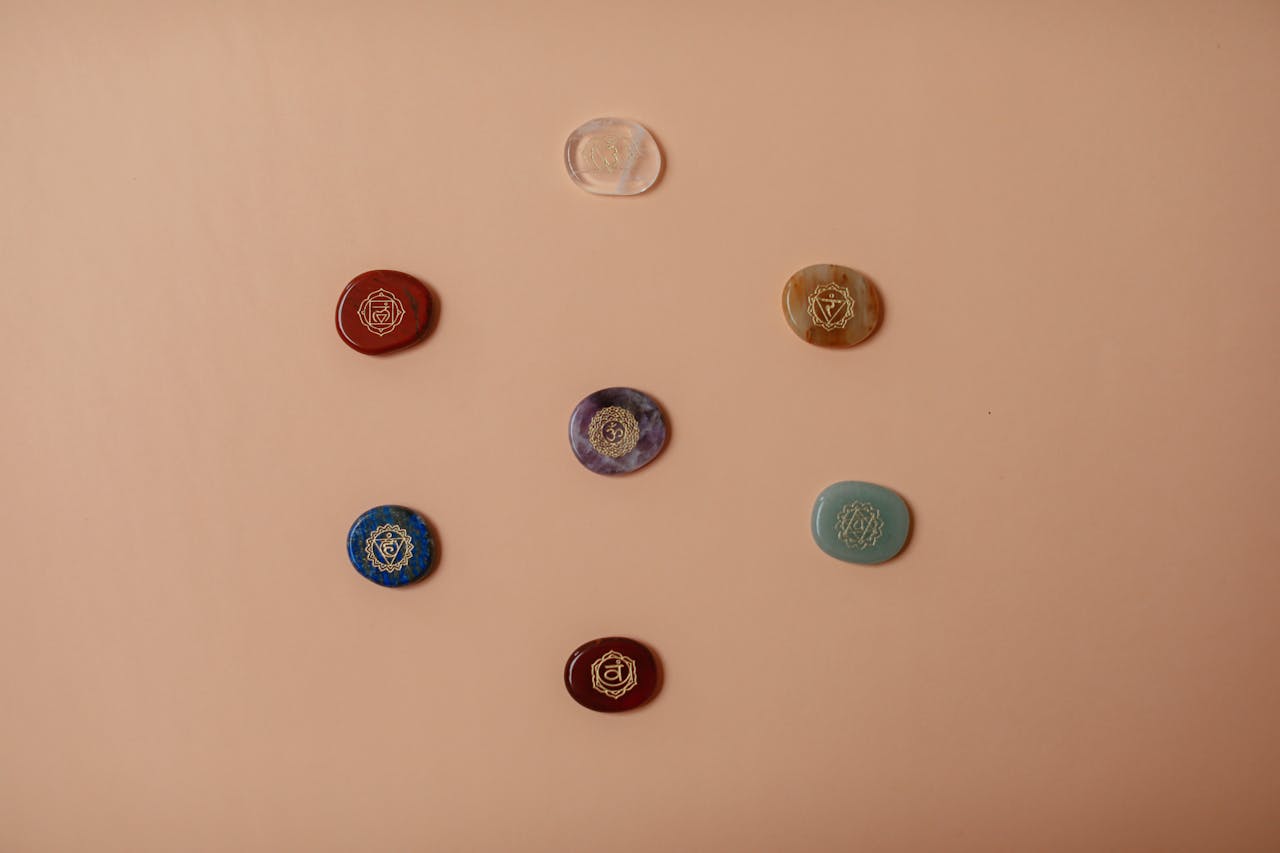 Close-Up Shot of Chakra on a Brown Surface